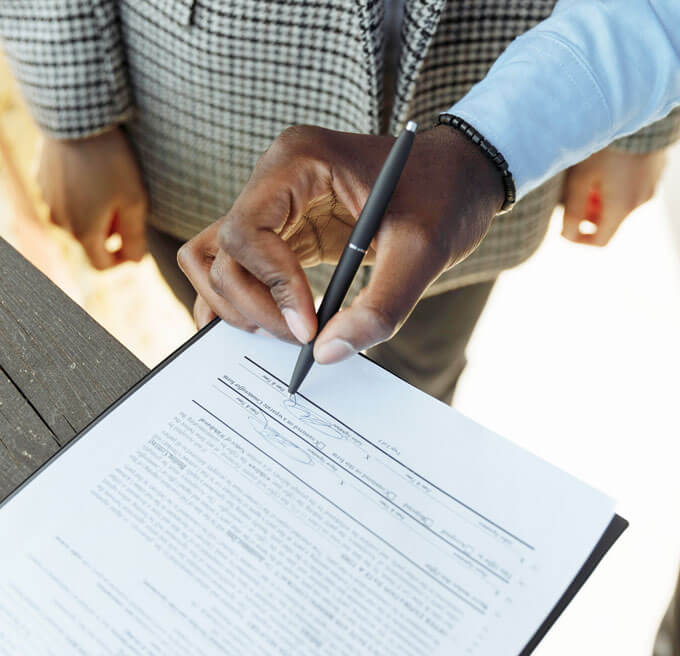 Man signing a document