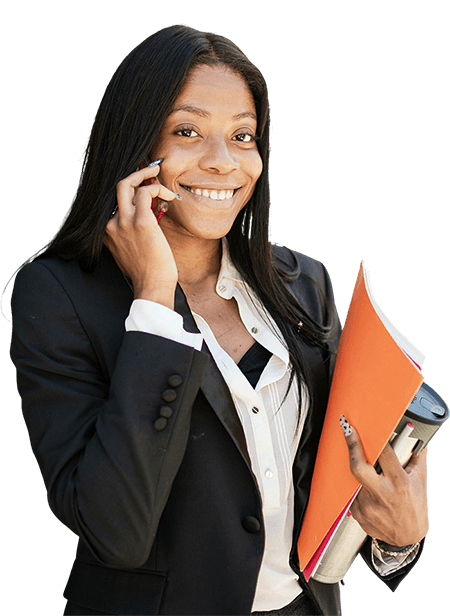 Female executive making a phone call in an office